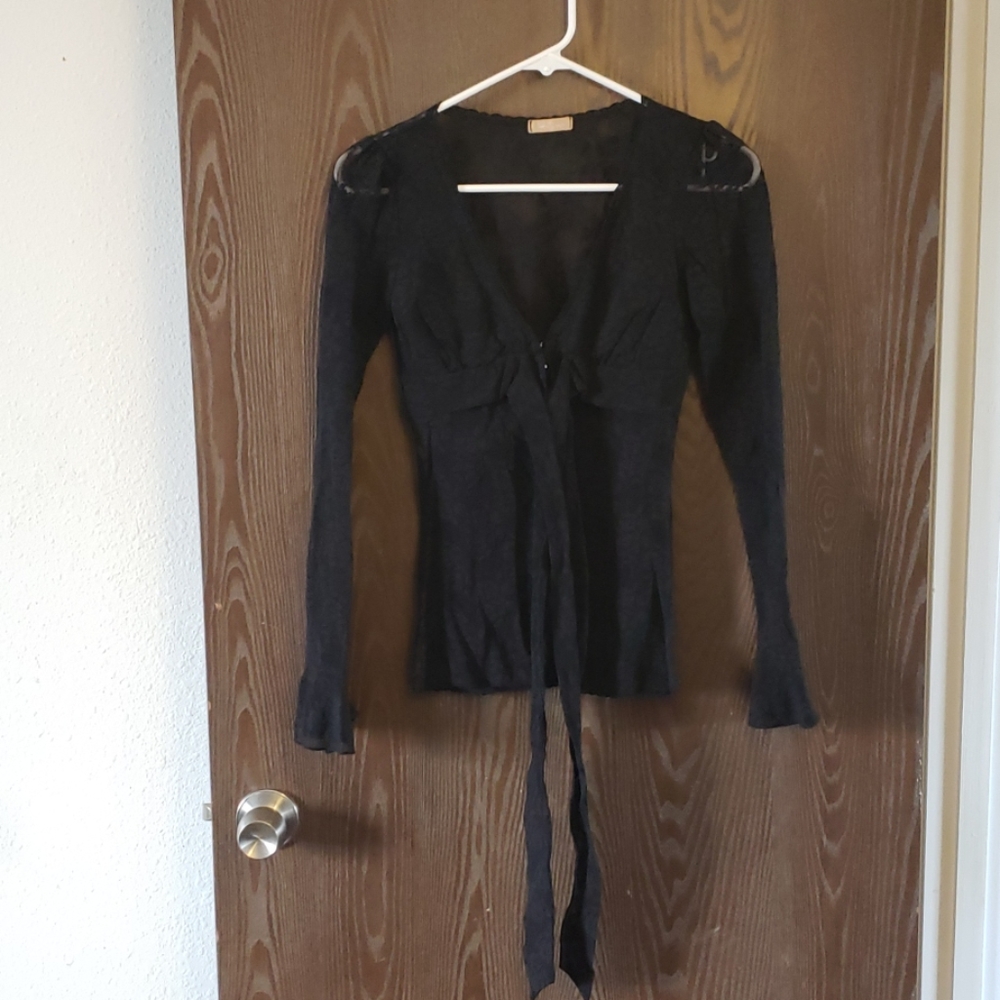Any item with a  🌹 from my closet is 5 for $20!  Black lace long sleeve shirt.